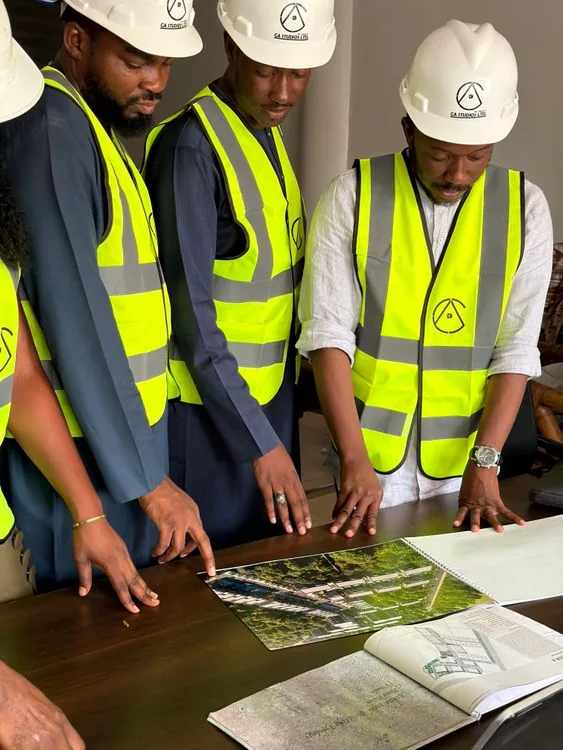 Construction professionals reviewing a site plan