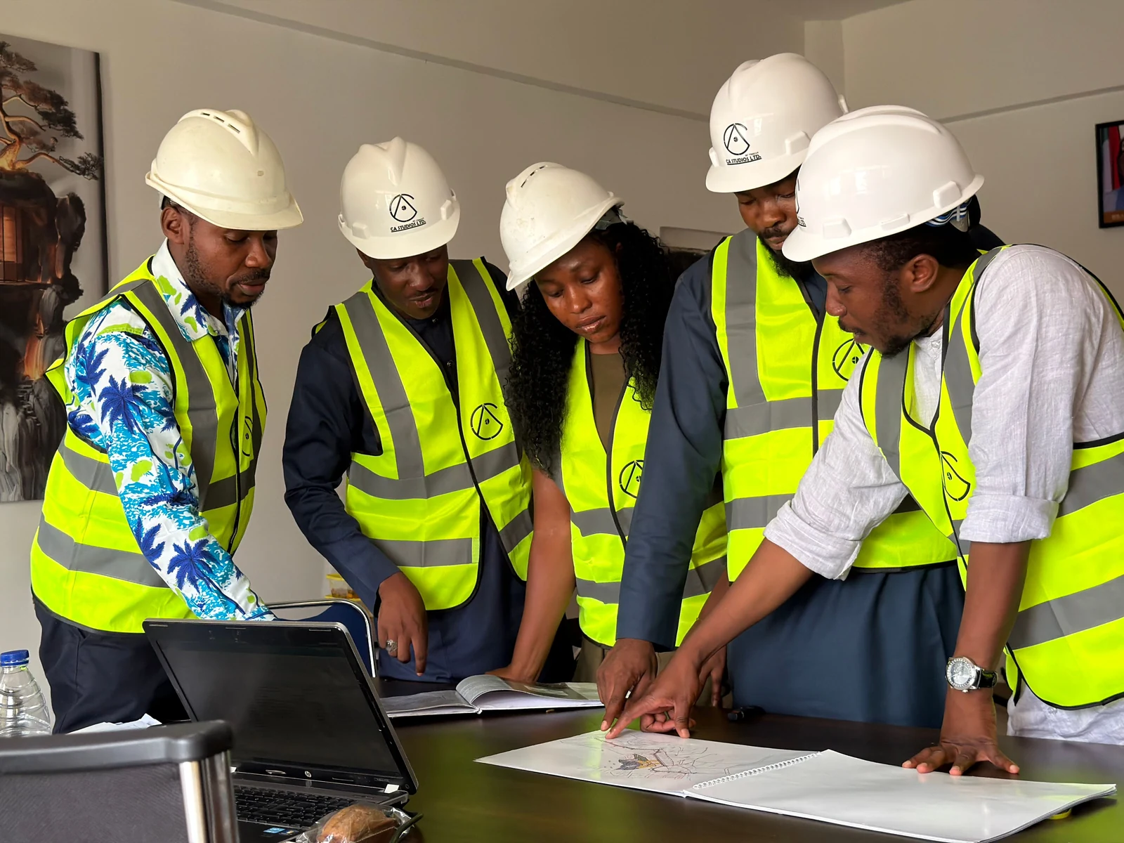 Professionals reviewing plans together